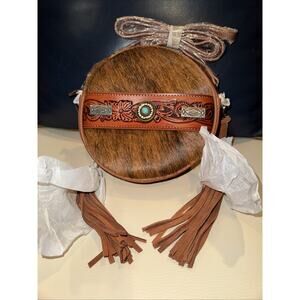 Trinity Ranch Hair On Cowhide Crossbody bag with a turquoise stone accent NWT